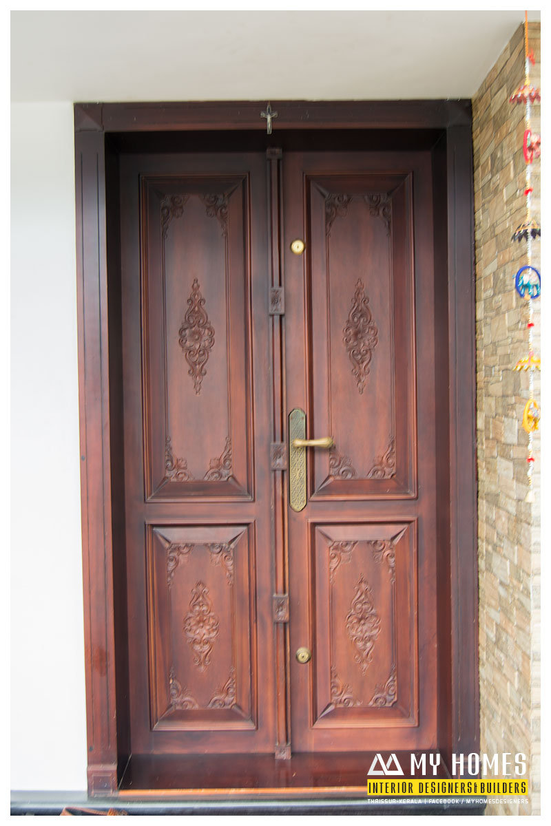 Delicate Front Wooden Door Designs Kerala