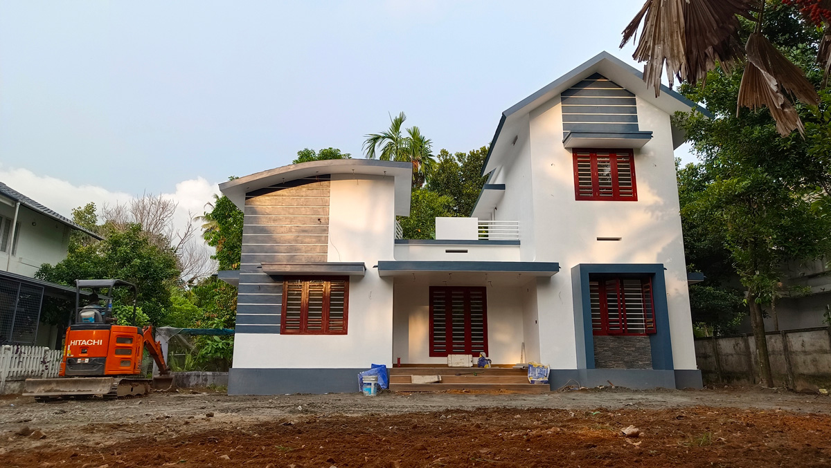 slope roof house kerala